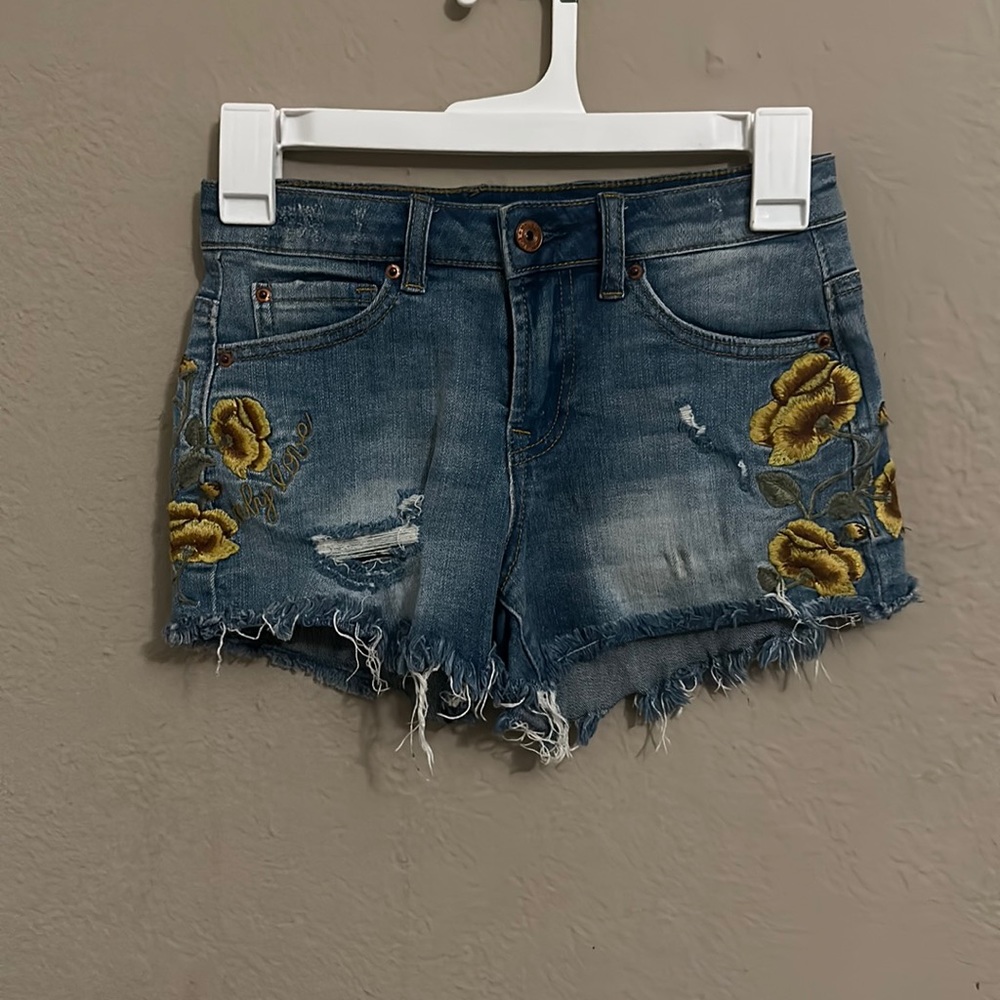 Vanilla star mid rise denim shorts with yellow flowers
